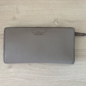 Kate Spade New York Cameron Large Slim Bifold Warm Soft Taupe Wallet WLRU3444